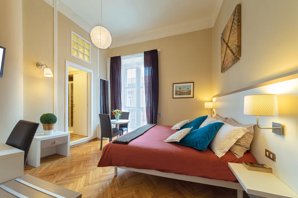 Deluxe Triple Room | Down comforters, in-room safe, individually decorated