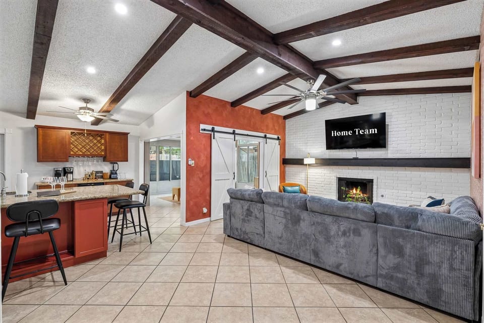 Make yourself at home! Mix a drink at the bar, then head to the sectional for a movie by the fire. Whether watching the game or sliding the barn doors shut for a private retreat, this open space is designed for your ultimate relaxation.