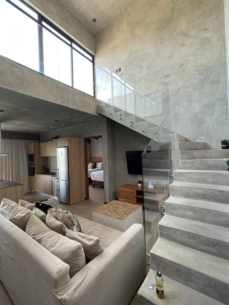 Two bedrooms on first level, one king bedroom 3, second level up these stairs.