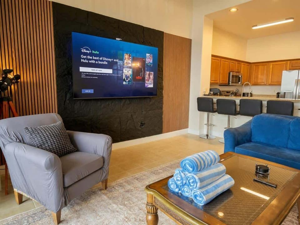 85 inch SMART TV in living area makes movie nights amazing!