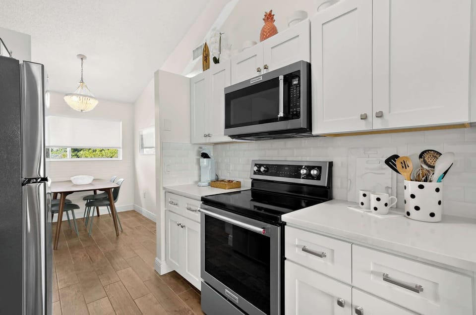 Kitchen with Stainless Steel Appliances and White Cabinets
