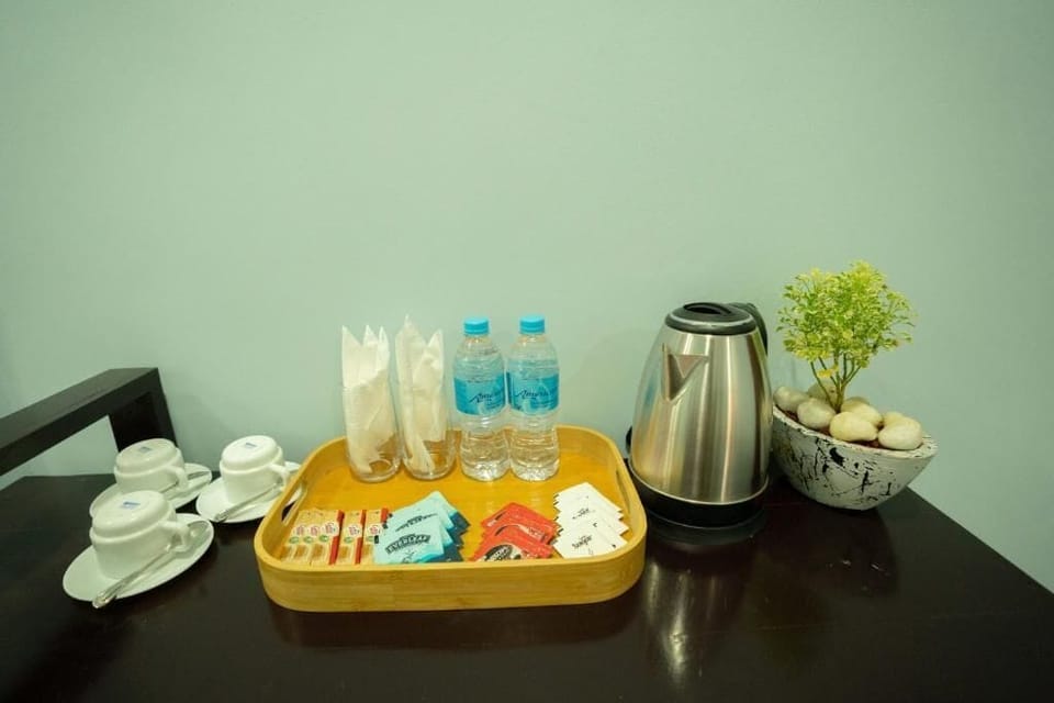 Deluxe Double Room, Balcony, Garden View | Coffee and/or coffee maker