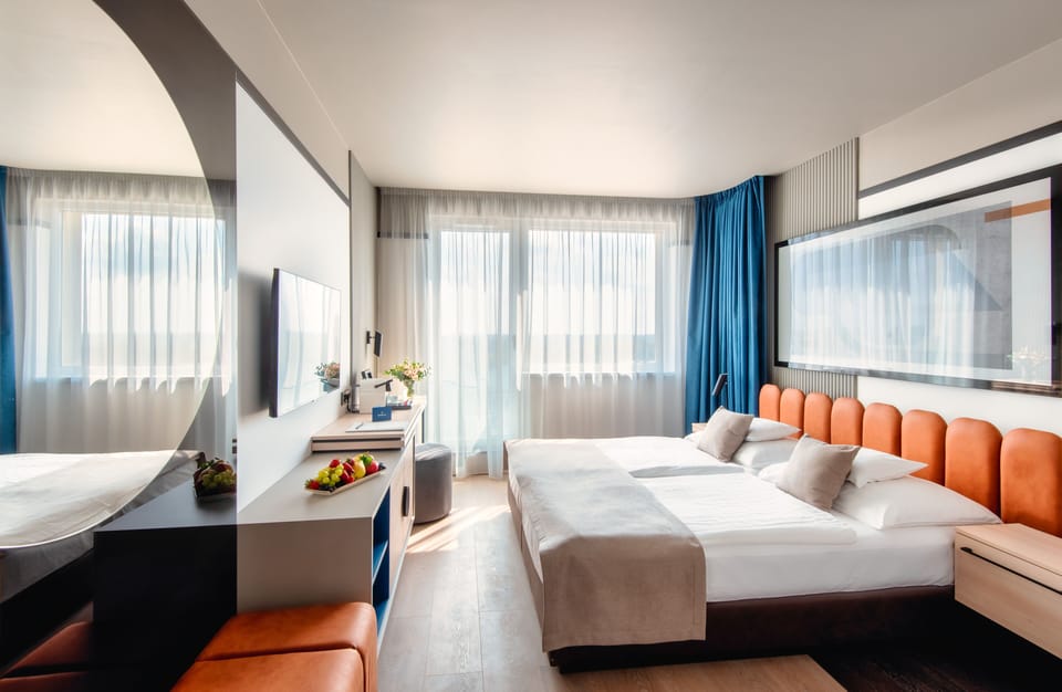 Minibar, in-room safe, blackout drapes, free WiFi