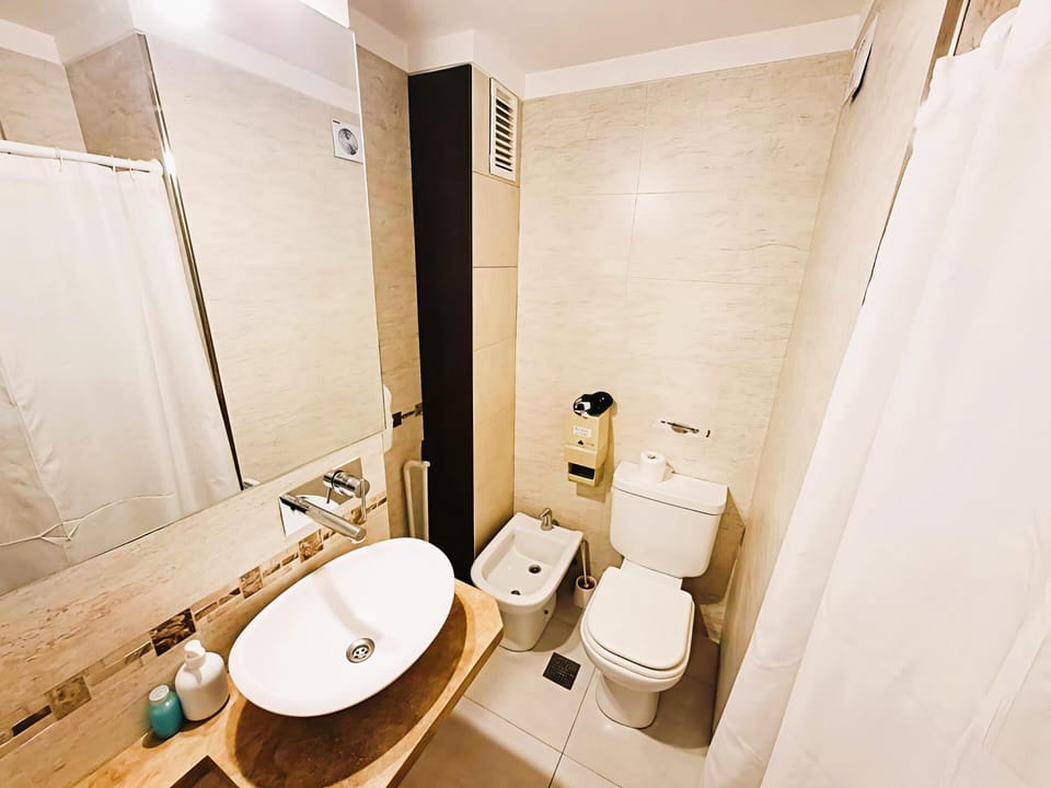 Basic Double or Twin Room | Bathroom | Shower, hair dryer, slippers, bidet