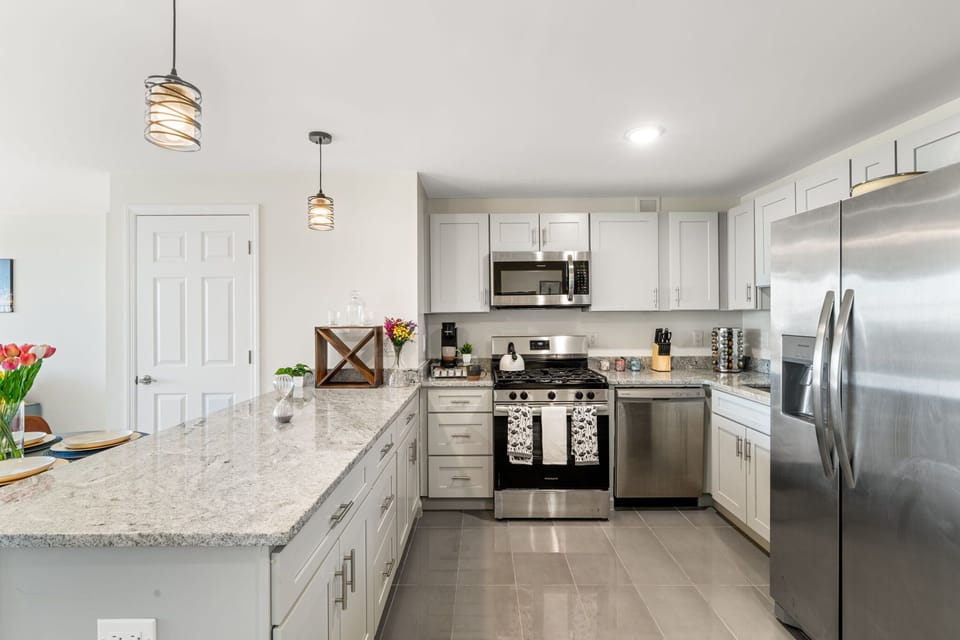 Fully equipped kitchen with everything you need to cook, prep, or settle in for longer stays.