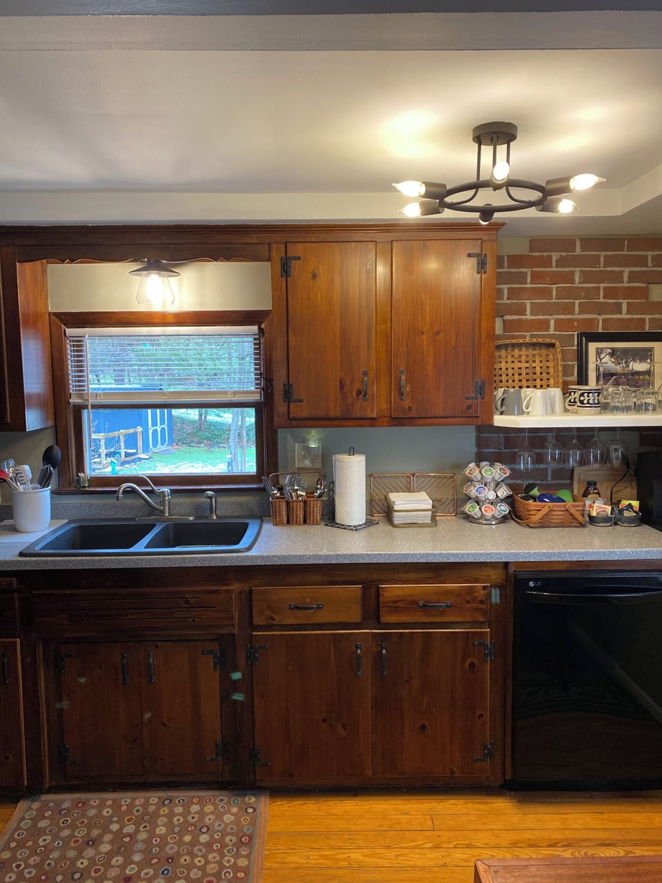 Here's a view of the sink(s), cabinets and dishwasher.  