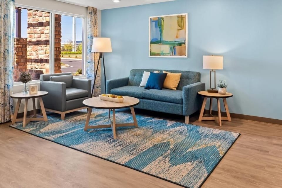Unwind on plush seating in a bright, stylish lounge.