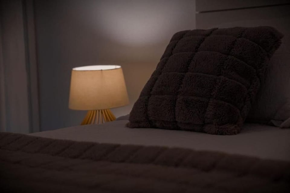 Deluxe Suite, 1 King Bed, Garden View | In-room safe, desk, laptop workspace, iron/ironing board