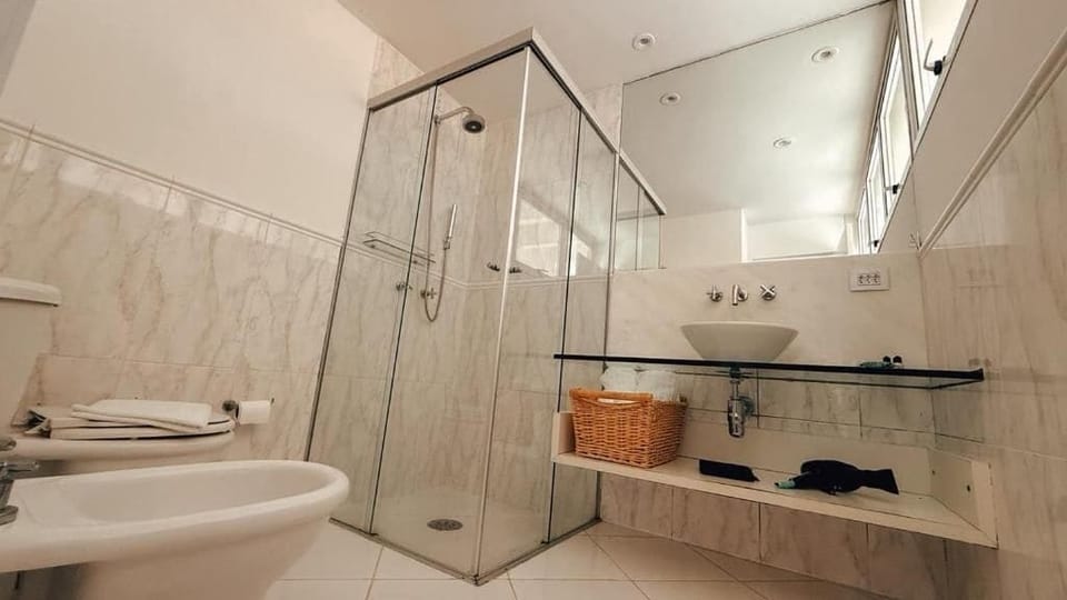 Suite, 1 King Bed, Pool View | Bathroom | Shower, free toiletries, hair dryer, towels