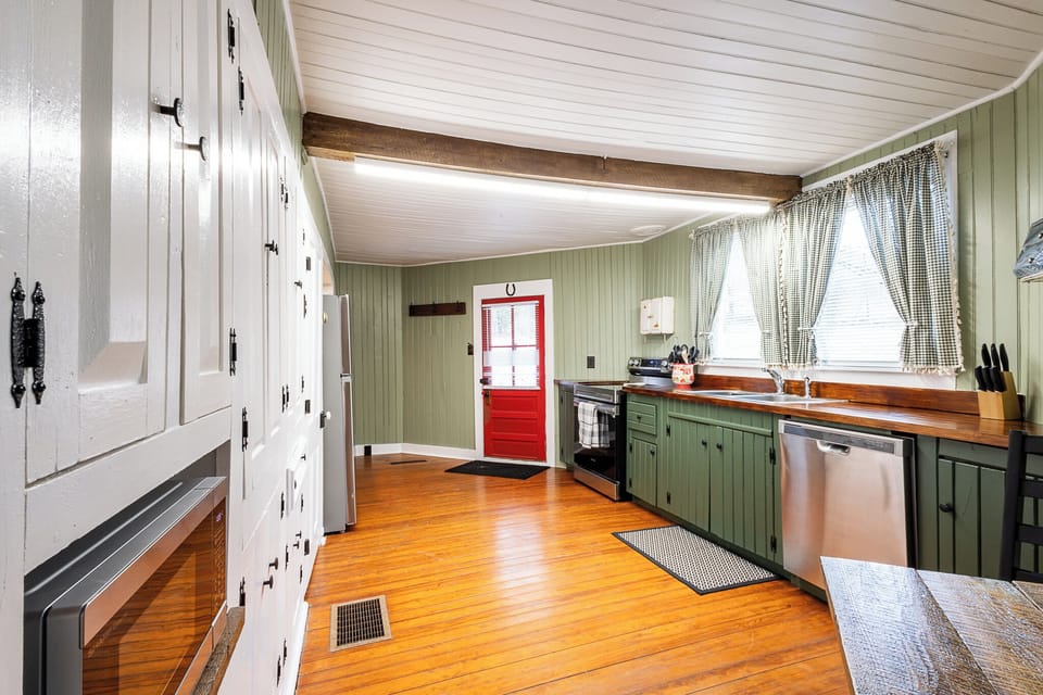 This kitchen includes the original cabinets from 1880 and is stocked with all the basics for your stay.