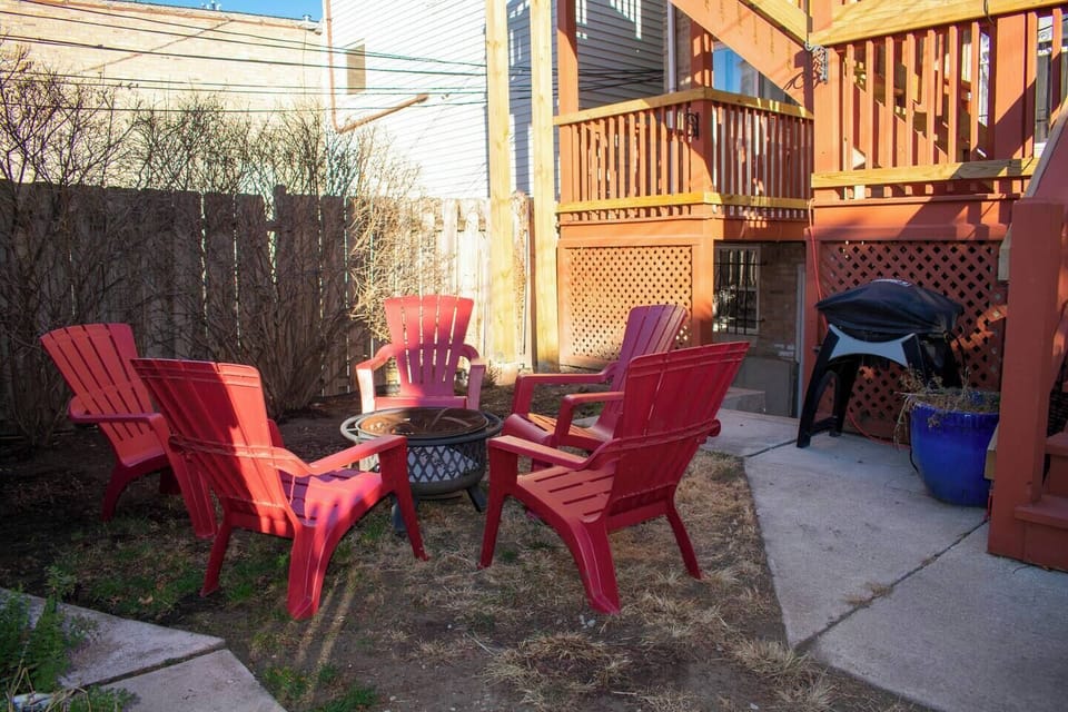 Shared backyard seating/firepit area