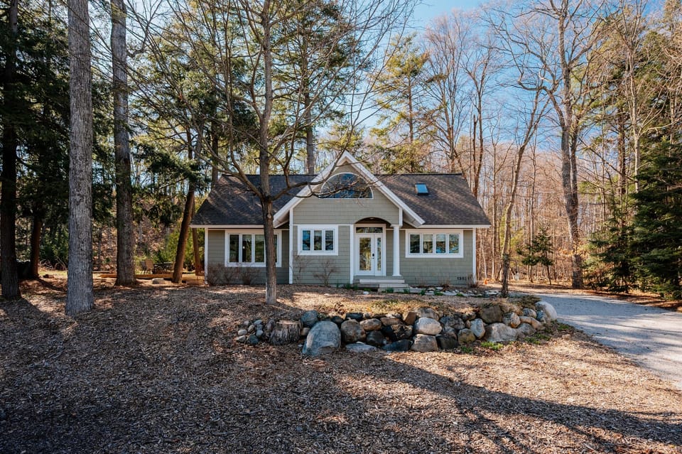 Tucked into a quiet wooded setting. 