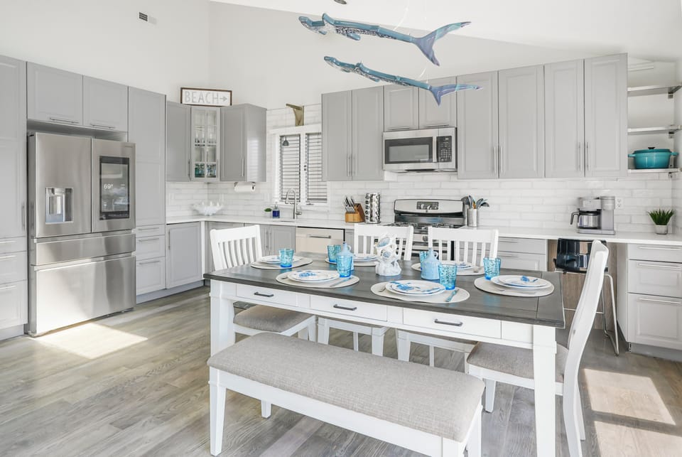 Beautifully updated kitchen with quartz countertops and subway tile. Just Wow!