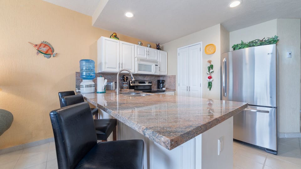 THe complete kitchen has cookware, and all appliances.