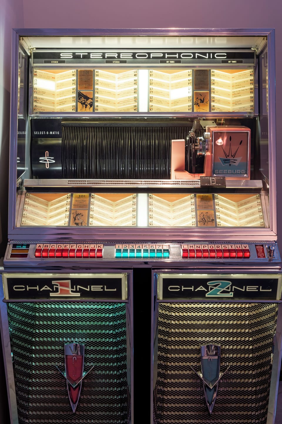 Vintage jukebox adds timeless character and nostalgic charm, creating the perfect soundtrack for evenings spent enjoying the home's entertainment spaces.