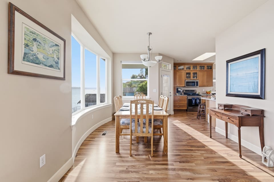 Open dining space connects easily to the kitchen and living area.