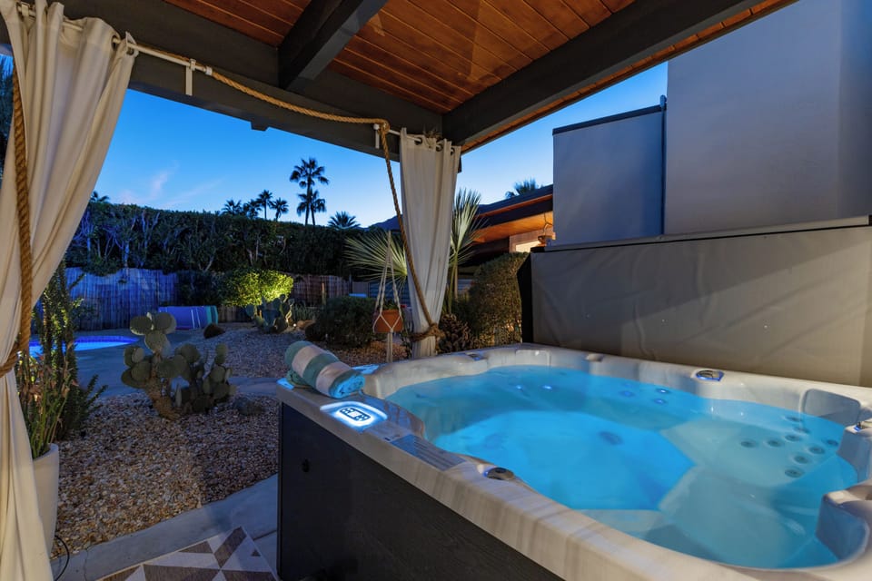 Soak in your private hot tub under the desert sky, where warm bubbles and twinkling lights create pure magic.