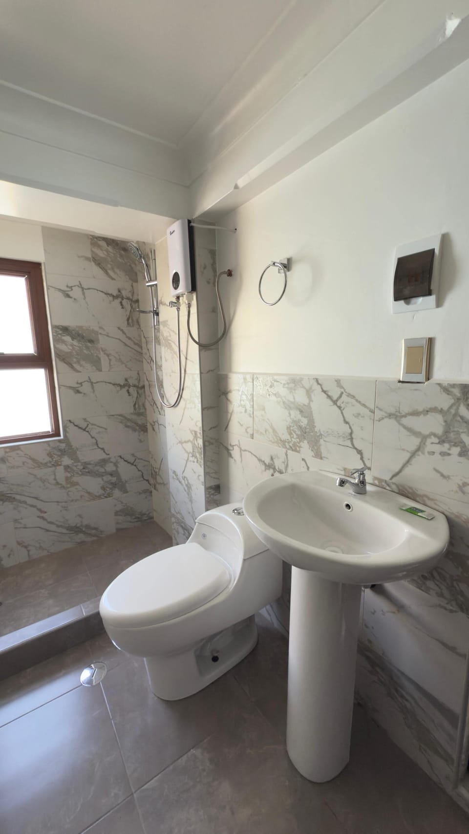Shower, towels, soap, toilet paper