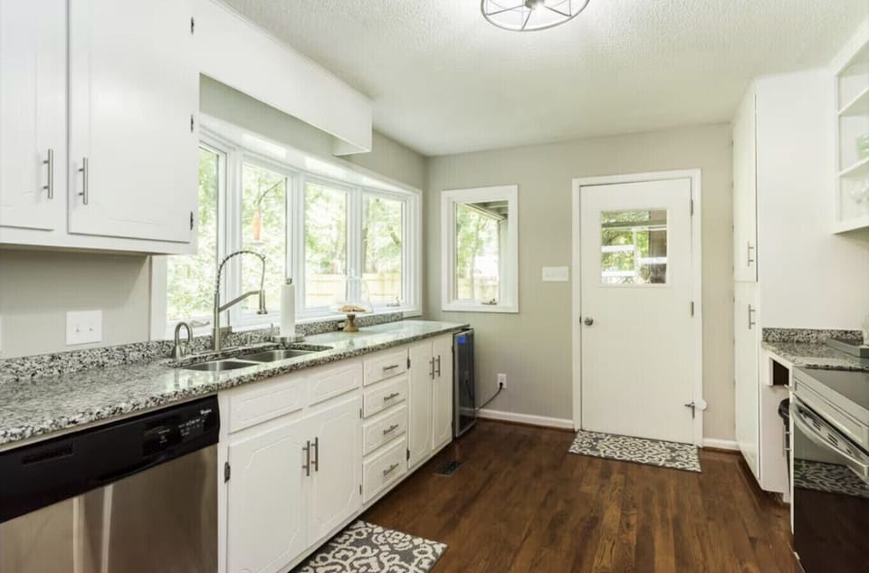 Kitchen with granite countertops and stainless steel appliances