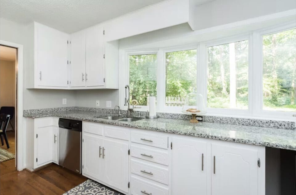 Kitchen with granite countertops and stainless steel appliances