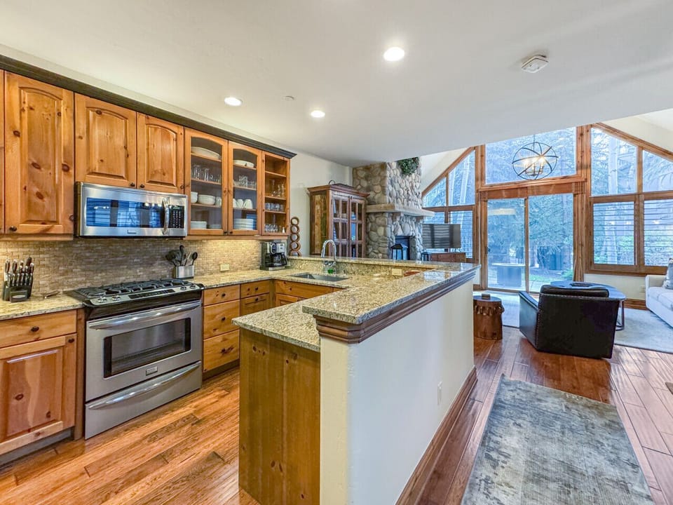 A chef-worthy kitchen with stainless appliances, a generous island, and everything you need. Mountain mornings start here, unhurried, warm, and fully yours