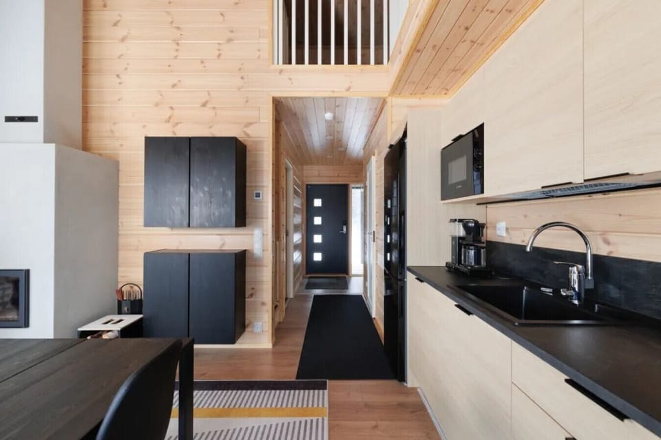 The entrance features a spacious hallway with ample storage for all your heavy winter gear and ski apparel.