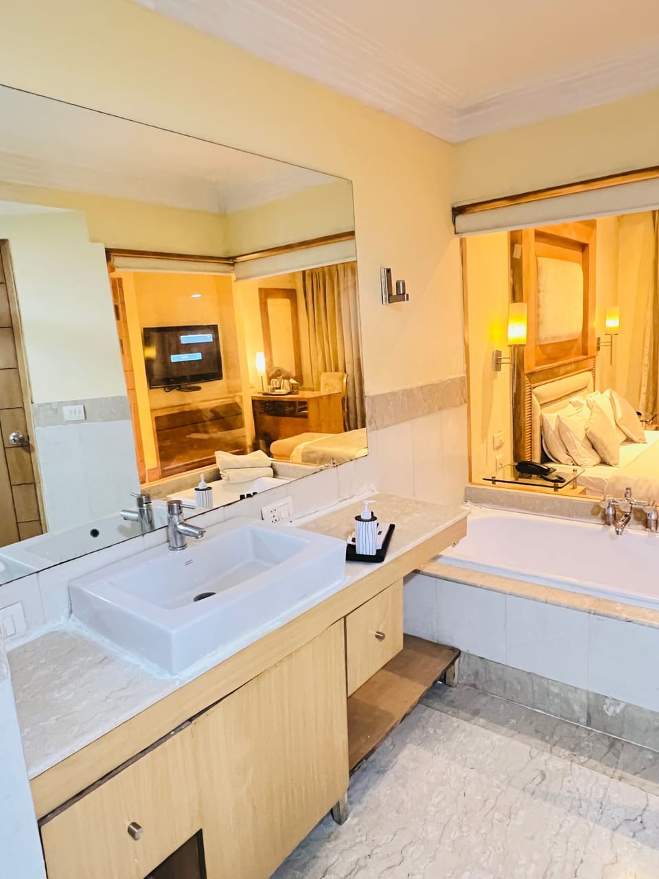 Separate tub and shower, free toiletries, hair dryer, slippers