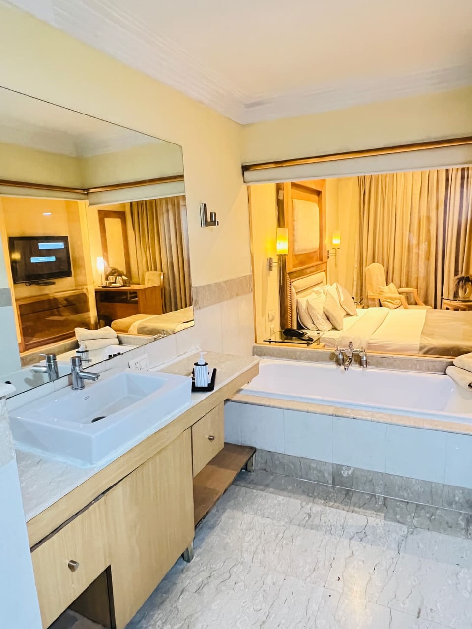 Separate tub and shower, free toiletries, hair dryer, slippers