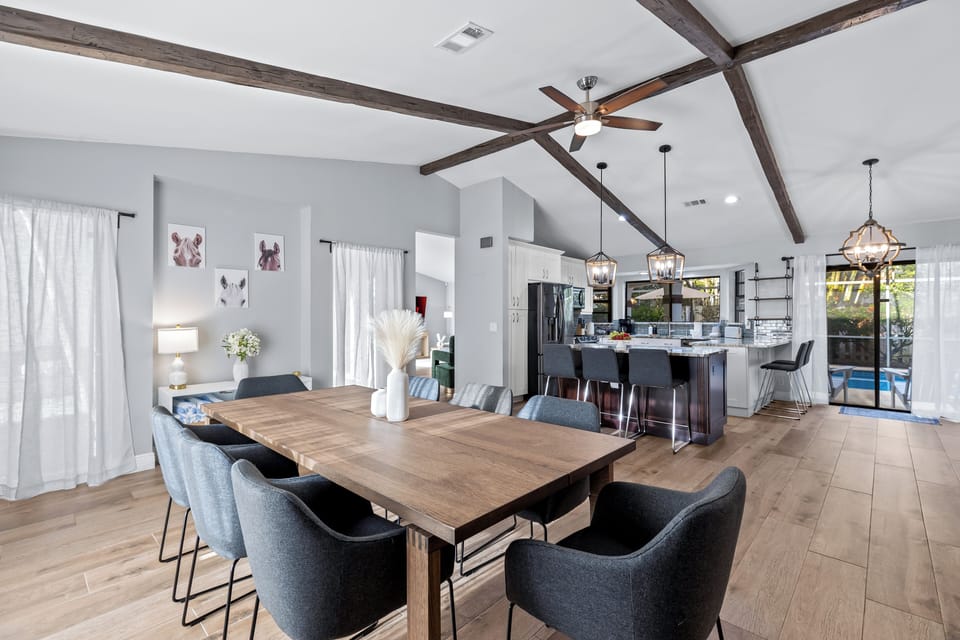 Enjoy memorable meals and conversations in the stylish dining room with seating for the whole group.