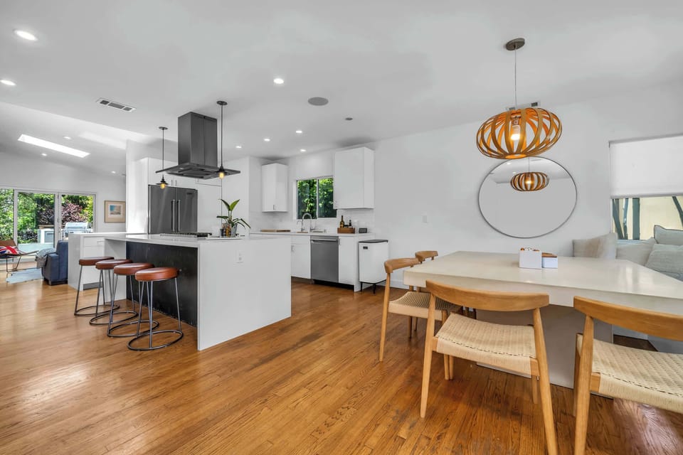 Bright, open living anchored by a chef’s kitchen, designed for easy flow between cooking, dining, and gathering.
