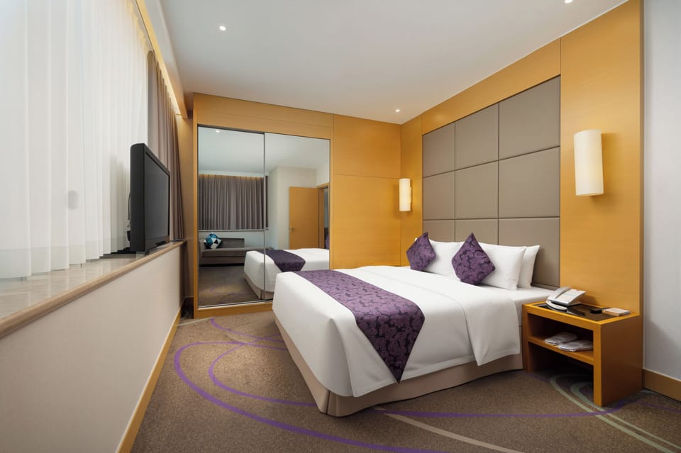 Family Suite | Down comforters, in-room safe, desk, blackout drapes