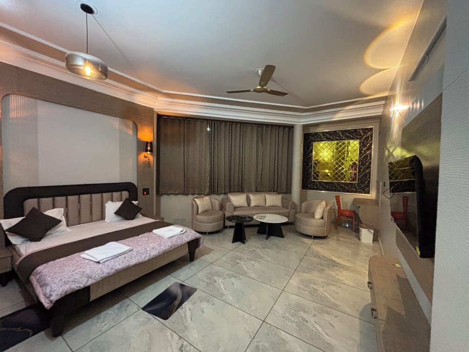 Luxury Double or Twin Room, Garden View | Desk, laptop workspace, blackout drapes