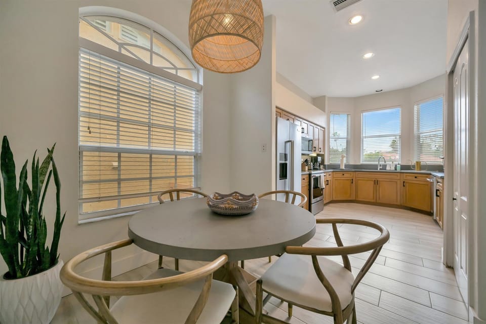 Dining nook with oversized windows