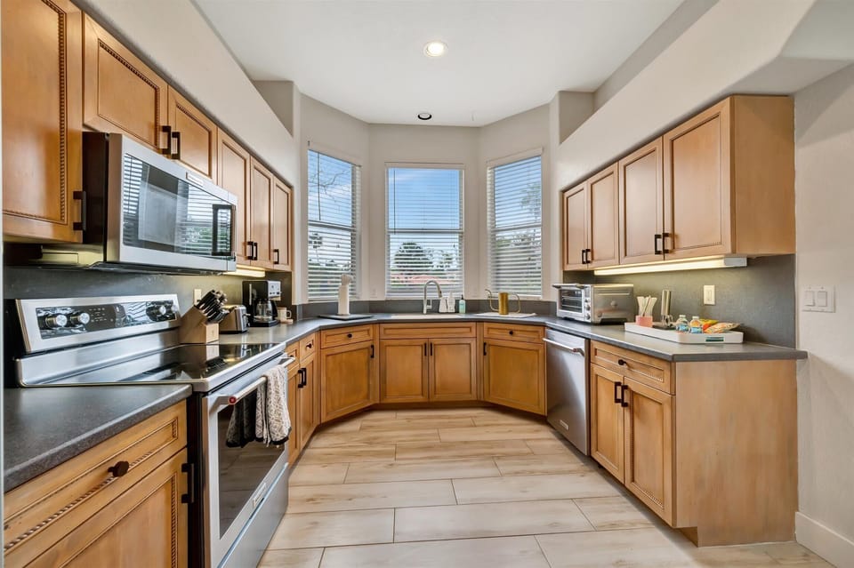Open kitchen with full appliance setup