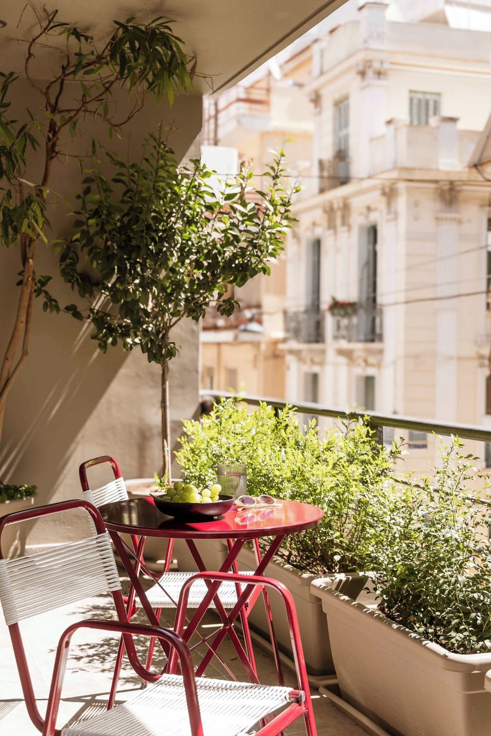 Charming Outdoor Balcony with Bistro Seating