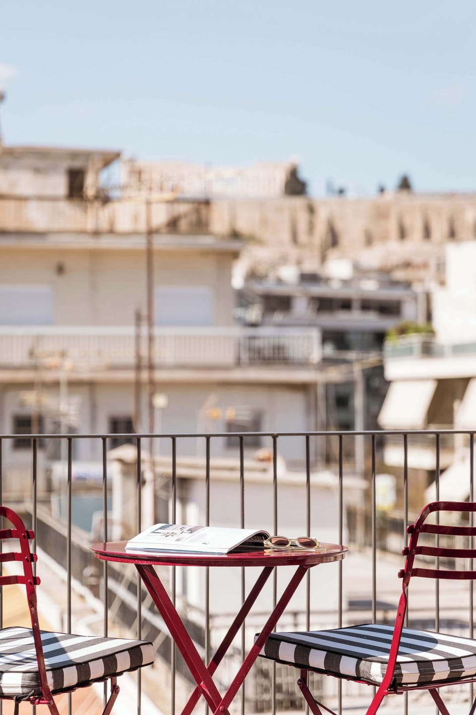Stylish Balcony with City Views and Outdoor Seating
