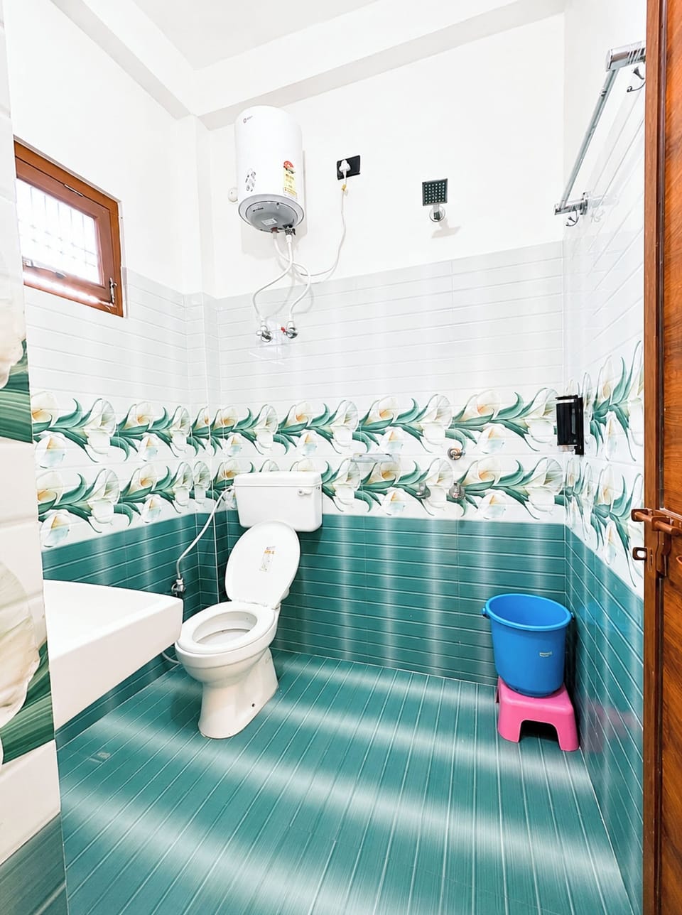 Shower, rainfall showerhead, slippers, towels