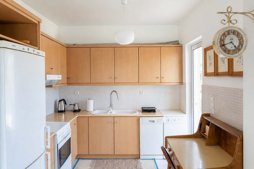 Fully equipped kitchen with ample storage, modern appliances, and everything needed to prepare home-cooked meals comfortably during your stay