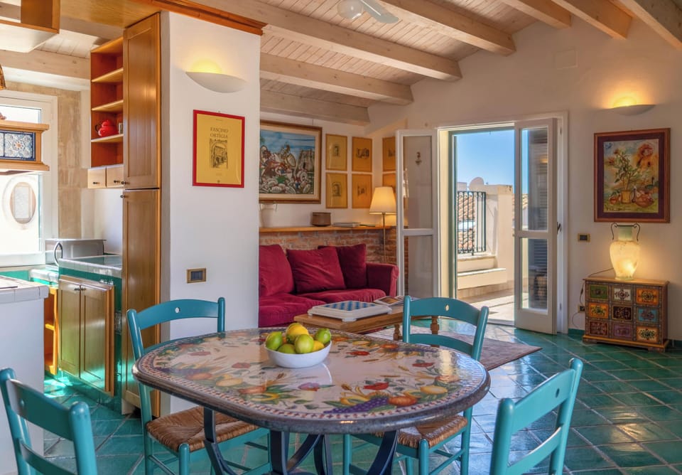 Comfort Apartment, Sea View | Living area | 50-inch flat-screen TV with satellite channels