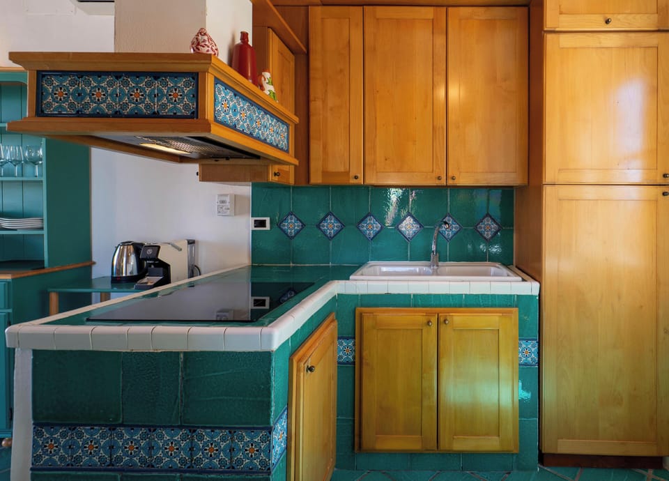 Comfort Apartment, Sea View | Private kitchen | Full-size fridge, microwave, stovetop, espresso maker