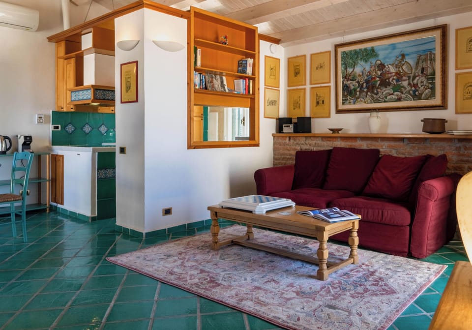Comfort Apartment, Sea View | Living area | 50-inch flat-screen TV with satellite channels