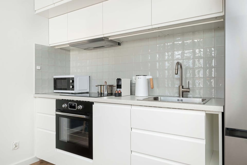 The fully equipped kitchenette includes everything you need for a home-cooked meal.