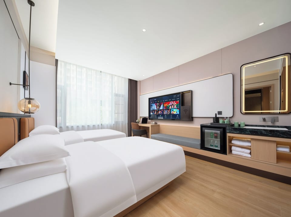 Business Triple Room, 2 Bedrooms | Premium bedding, down comforters, pillowtop beds, free minibar