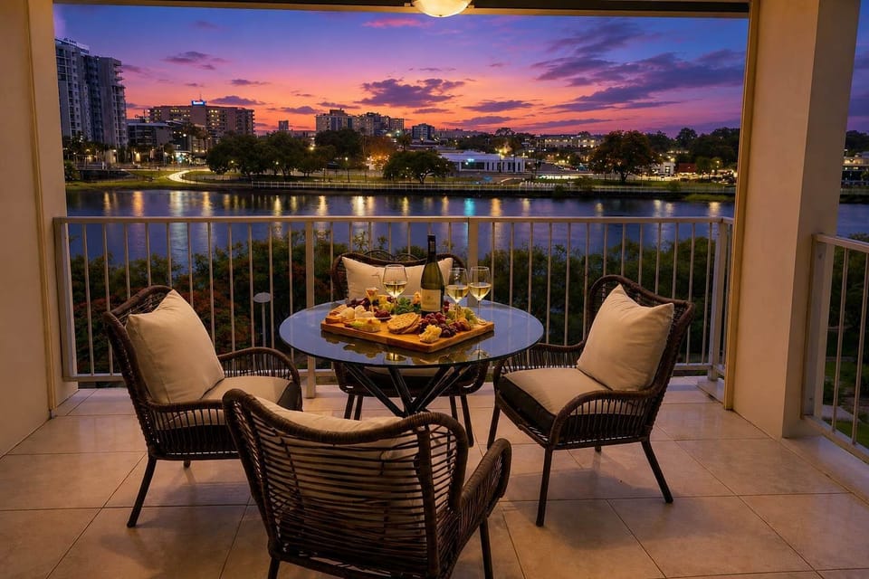 Sunset Drinks on the Riverfront Balcony