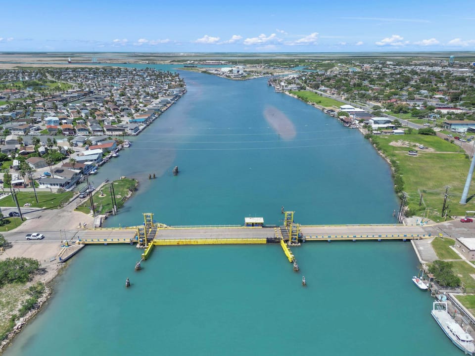 Watch the boats glide along the Laguna Madre