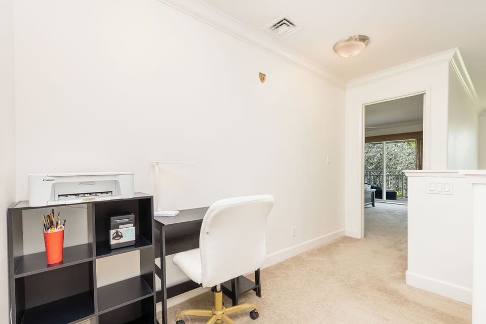 Hallway with a desk for remote workers
