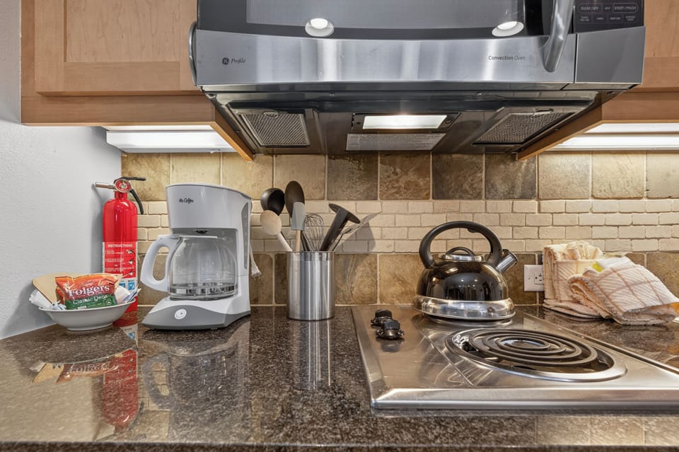 Your fully equipped kitchen includes a microwave, stove, coffee maker, and all the essentials for preparing meals just the way you like them.