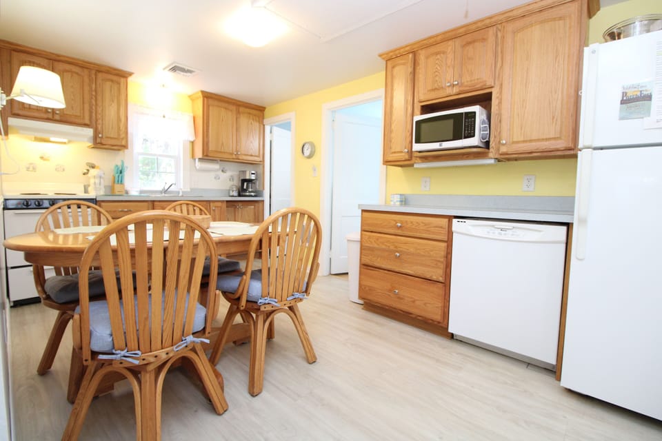 Eat in Kitchen Area Showing Twin Room Door and Bathroom Door