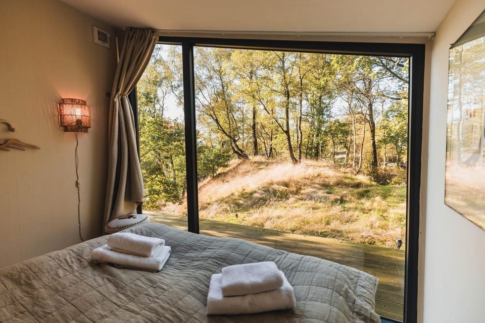Bedroom with view of nature