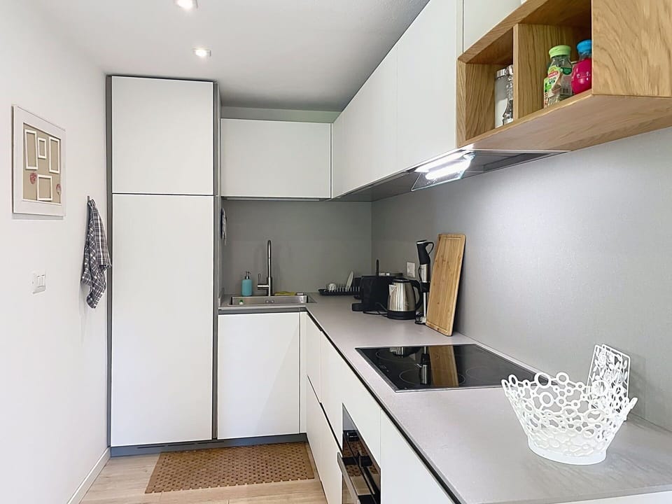 Furniture, Interior Design, Flooring, Chair, Floor, Table, Kitchen & Dining Room Table, Shade, Ceiling, Wood Stain